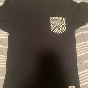 Vans “Alice in Wonderland” glow-in-dark shirt.